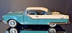 Franklin Mint, 1955 Pontiac Star Chief Hardtop, Turquoise, 1:24 Diecast Box. Fixed Price $135.00.