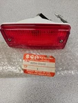 New Oem Suzuki Taillight Assy 35710-22A32 Fits 85-88 Quadsport LT230S. Fixed Price $20.00.