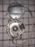 1985 Honda ATC200X Ignition Pulse Generator With Backing Plate And Cover. Fixed Price $100.00.