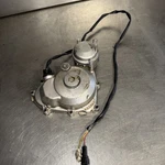 2004 04-09 Yamaha Left Ignition Cover With Stator #3. Fixed Price $95.00.